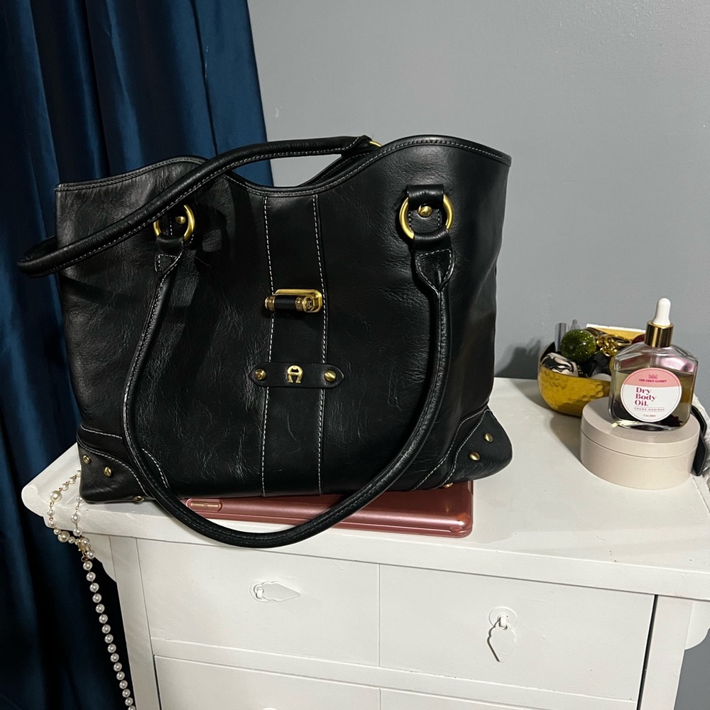 Etienne Aigner Elegant Black Tote with Gold Details